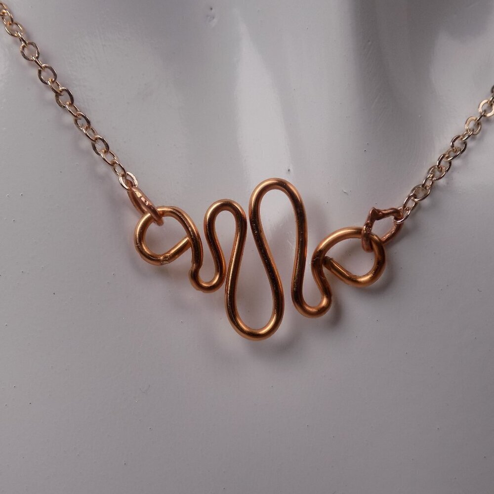Rose gold wire wrapped necklace